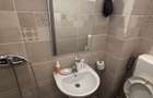 Garsoniera de vanzare etaj 1 zona Dovali Rm Valcea