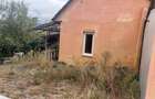 Casă cu Teren 2000 Mp în Răhău