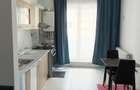 Studio 1 dormitor si living cu bucatarie + parcare 1 loc