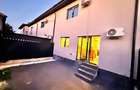 Casa 3 camere, 2 bai 2 dresinguri ,1 balcon curte proprie 35 mp, 2 locuri de parcare