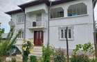 Casă cu 7 camere cu Teren 1200 Mp în Central