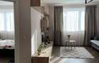 De inchiriat 2 camere, parcare sunterana, zona BMW - 5