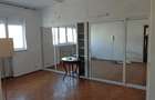 Apartament cu 4 camere, cu o suprafa?a utila de 105 m2, situat intre Pia?a Romana ?i Calea Victoriei - 4