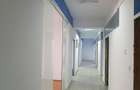 Cladire de birouri si spatii comerciale P+4E, stradal la DN1