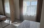 Dau spre inchiriere un apartament cu 2 dormitoare si living bucatarie open space - Calea Buziasului - 13