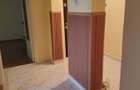 Etaj 1 - apartament 2 camere confort 1 decomandat - Zona Vidin.