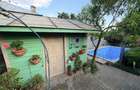 Casa cu piscina si gradina de vis in centrul Domnestiului - 17