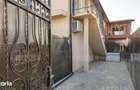 Apartament mobilat ?i utilat complet, cu curte proprie