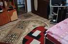 Casa cu 2 camere, teren 1000 mp, acces asfaltat