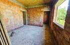 Casă la roșu cu 4 camere, 122 mp utili, teren 465 mp – Băicoi