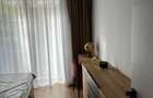 Apartament cu gradina propie