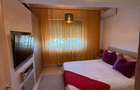 Apartament cu 3 camere decomandat, 2 bai, loc de parcare inclus