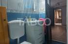 Casa in zona centrala 5 camere 2 bucatarii 3 bai curte comuna Cisnadie - 22