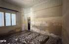 Casa de renovat cu teren 557 mp, central Str. Gh. Bari?iu - Carei