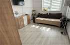 Zona Tractorul 3 camere ,2 bai,etajul 1 din 4 ,loc de parcare - 7