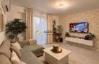 Apartament 2 camere cu gradina privata de 51 mp, foisor si 2 locuri p