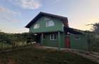 Casă cu 4 camere cu Teren 3500 Mp în Husnicioara