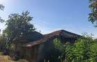 Casă batrîneasca + teren de vînzare