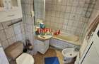 Apartament complet decomandat, 3 camere, 2 bai si garaj inclus