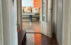 Apartament cu patru dormitoare , livin spatios , trei bai , bucatarie . Zona centrala - 3