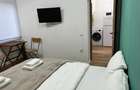 Apartament 2 camere la prima inchiriere,curte-zona Sinaia, centru