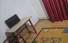 Inchiriez apartament 2 camere bloc T1 et 2 zona Monument Bal? jud Olt - 4