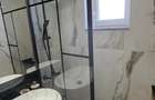 Dau spre inchiriere un apartament cu 2 dormitoare si living bucatarie open space - Calea Buziasului - 17