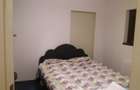 Inchiriez apartament cu 2 camere, la casa