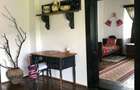 Proprietate cu poten?ial turistic reziden?ial: casa + 5.032 mp teren Puini, comuna Geaca, jud.