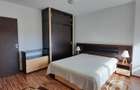 Apartament 2 camere (1 dormitor + living open space) Zona Nord Loc de parcare inclus