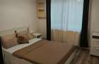 2 camere, decomandat, centrala termica, boxa și parcare 
