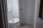 Garsoniera Craiovei de vanzare in bloc de apartamente