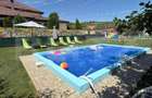 Casa individuala cu piscina, curte amenajata si afacere inclusa Un