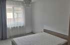 Apartament cu doua dormitoare, parcare proprie, mobilat si utliat - 3