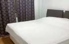 Apartament cu 2 camere decomandat , etaj 2, cu centrala ,aer conditionat si boxa