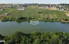 Teren intravilan cu deschidere 29 m.l la Lacul Lebada Rai - 2