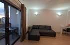 Garsoniera confortabila cu balcon ?i mobilier modern