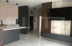 De inchiriat apartament cu 2 camere , 52mp , zona pia?a de - 5