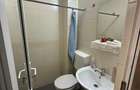 De vanzare apartament cu 2 camere si 2 bai, liber, pe Blv. Roman Musat - 8