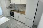 Garsoniera in bloc nou - 6