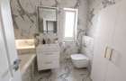 Apartament nou cu 4 camere, 100mp, etaj 1, superfinisat, mobilat si utilat, cu garaj sub bloc, 2 bai - 5