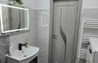 Apartament premium cu terasa si loc de parcare situat in zona centrala