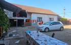 Casă cu teren de 1.000 mp, anexe și livadă – oportunitate în