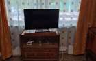 Inchiriez apartament , etaj 1 Bulevardul Roman Musat - 1