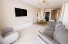 Apartament nou cu 4 camere, 100mp, etaj 1, superfinisat, mobilat si utilat, cu garaj sub bloc, 2 bai - 4