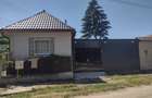 Casa de vanzare impreuna cu 2 terenuri intravilan , formand un tot unitar - 3