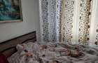 Apartament cu 4 camere decomandat în Roman - 6