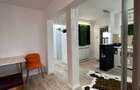 De vanzare apartament cu 3 camere situat pe Bd. Roman Musat, renovat - 13