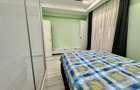 COSMOPOLIS - Apartament cu 3 camere si gradina, mobilat si utilat.