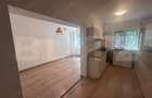 Apartament cu 2 camere, decomandat, centrala si AC, parter, cartier 1 Mai - 1